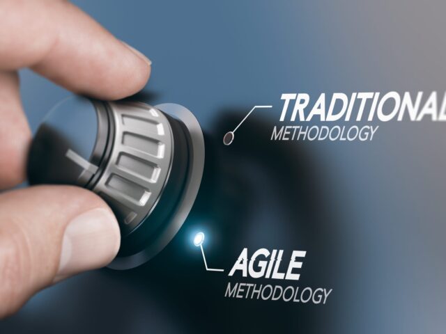 Man,Turning,Knob,To,Changing,Project,Management,Methodology,From,Traditional