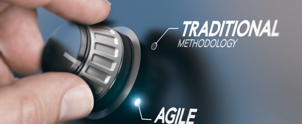 Man,Turning,Knob,To,Changing,Project,Management,Methodology,From,Traditional