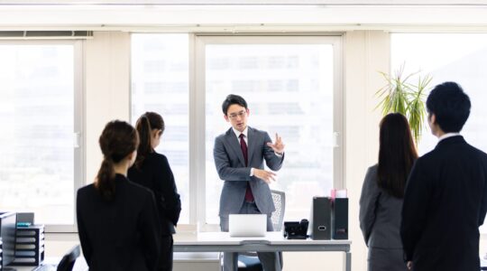 Asian,Manager,Speeching,In,Front,Of,Employees.,Autocratic,President.