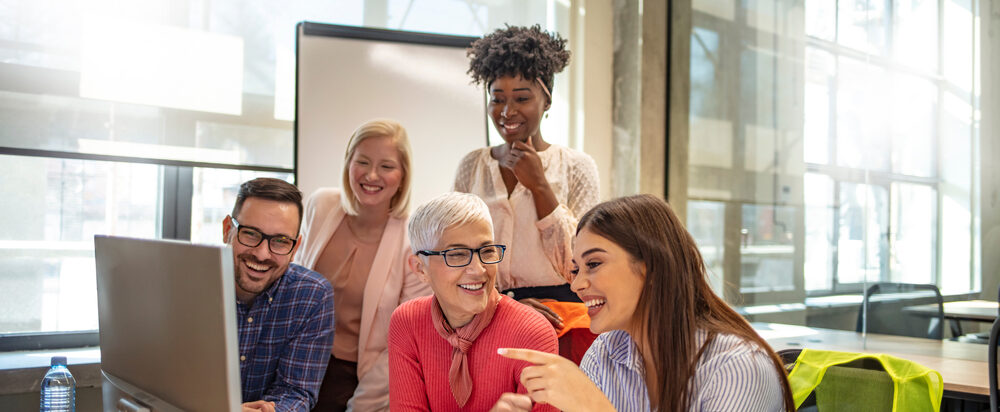 Shot,Of,A,Group,Of,Businesspeople,Sitting,Together,In,A