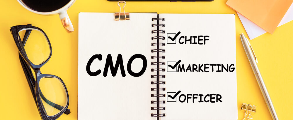 Cmo,-,Chief,Marketing,Officer,Acronym,,With,Text,On,Notepad