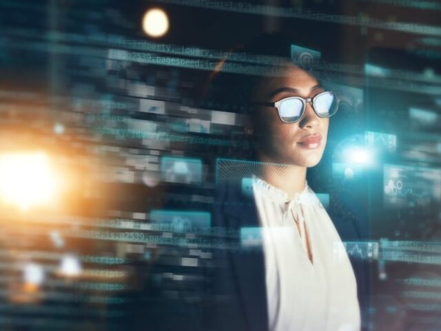 Digital,,Economy,And,Stock,Market,With,A,Woman,Trading,While