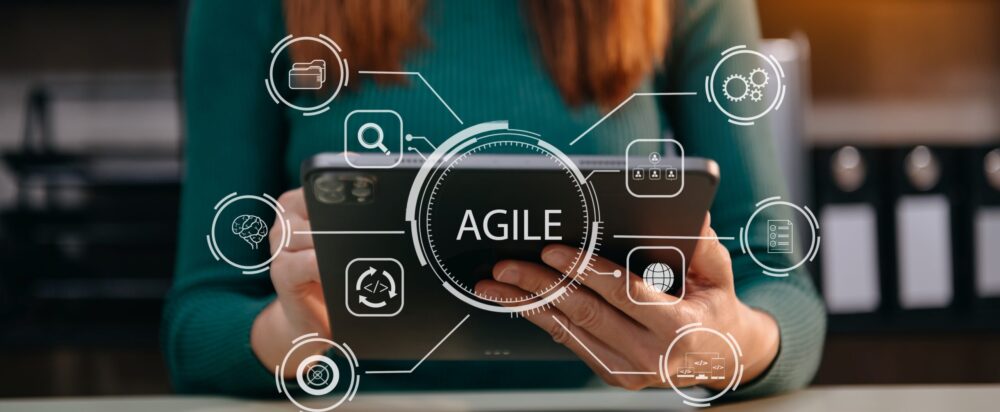 Agile,Development,Methodology,Concept.,Business,Hand,Using,Laptop,Computer,And