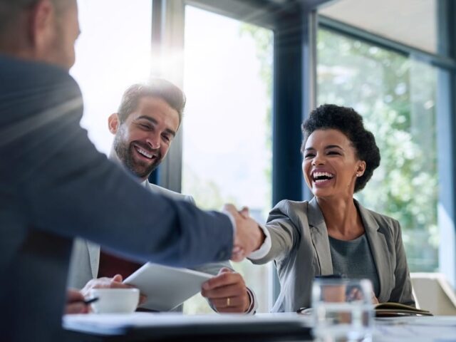 Meeting,,Partnership,And,Business,People,Shaking,Hands,In,The,Office