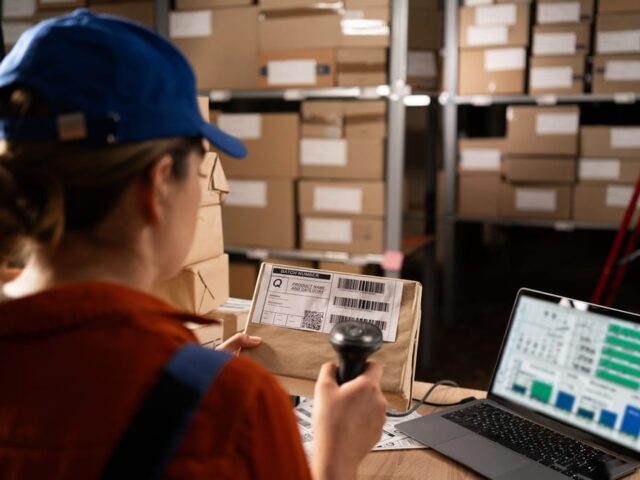 Woman,Worker,Working,With,Warehouse,Management,System,With,Barcode,Reader