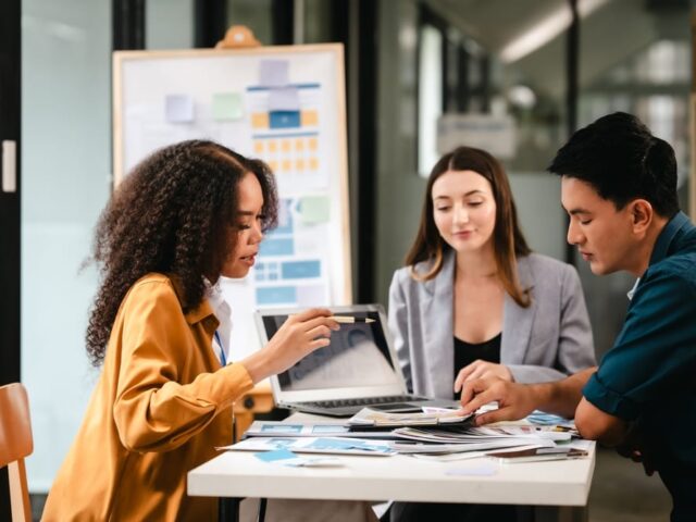 Diverse,Team,Of,Professionals,Engaged,In,A,Website,Graphic,Design