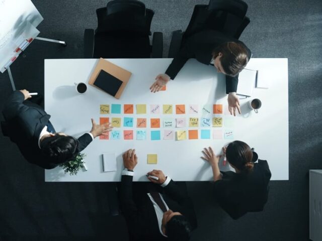 Top,Down,Aerial,View,Of,Skilled,Diverse,Business,Group,Choosing