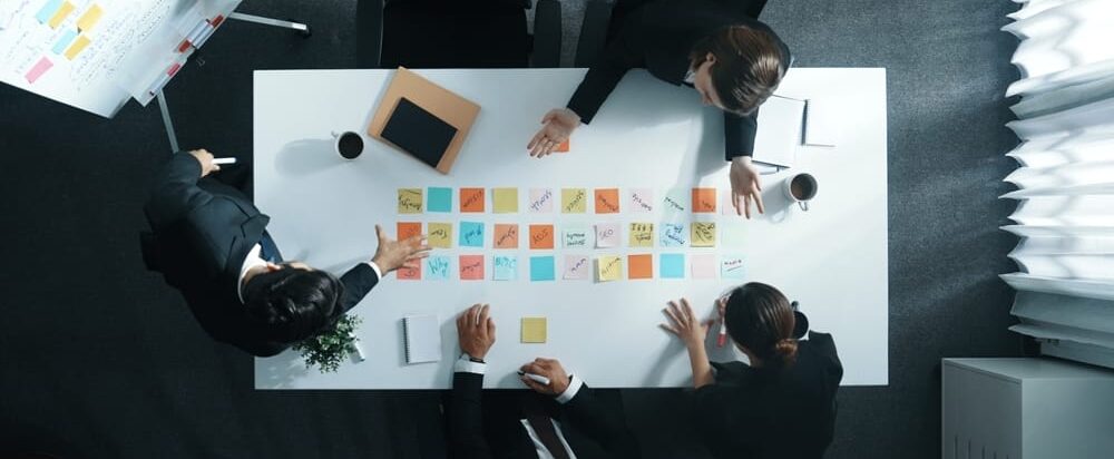 Top,Down,Aerial,View,Of,Skilled,Diverse,Business,Group,Choosing